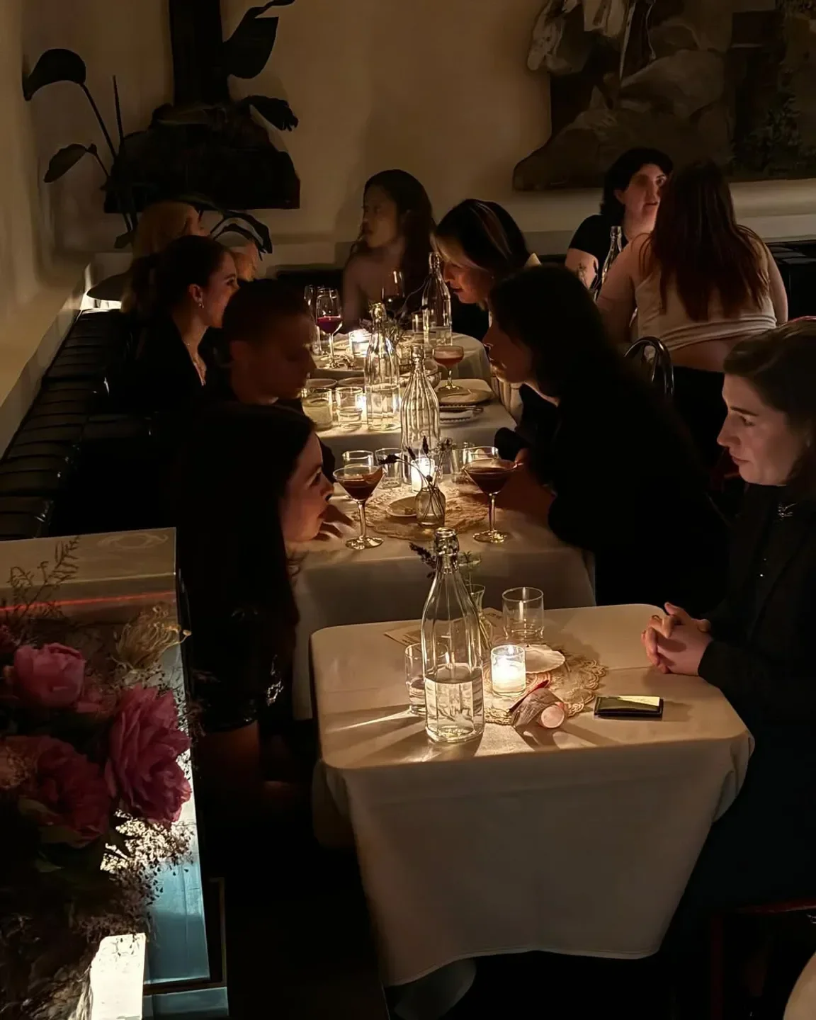 Elegant dining at Casino in New York City, people enjoying drinks at the restaurant.