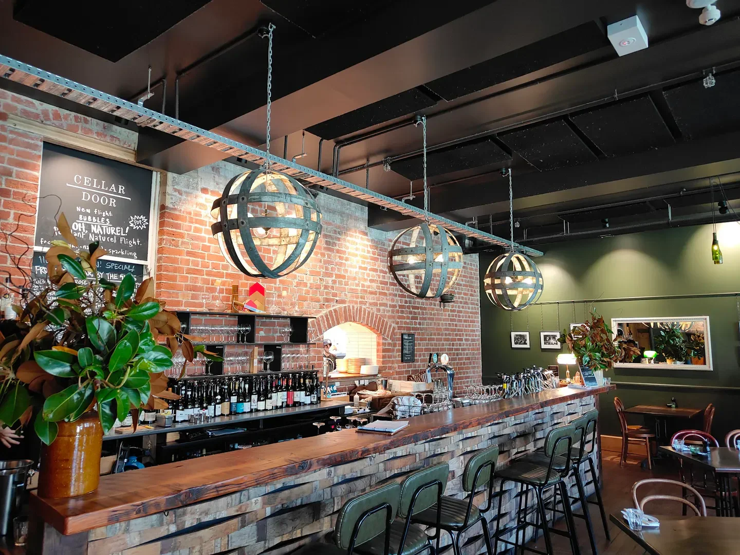 Interior of Cellar Door restaurant in Christchurch with stylish bar and lighting.