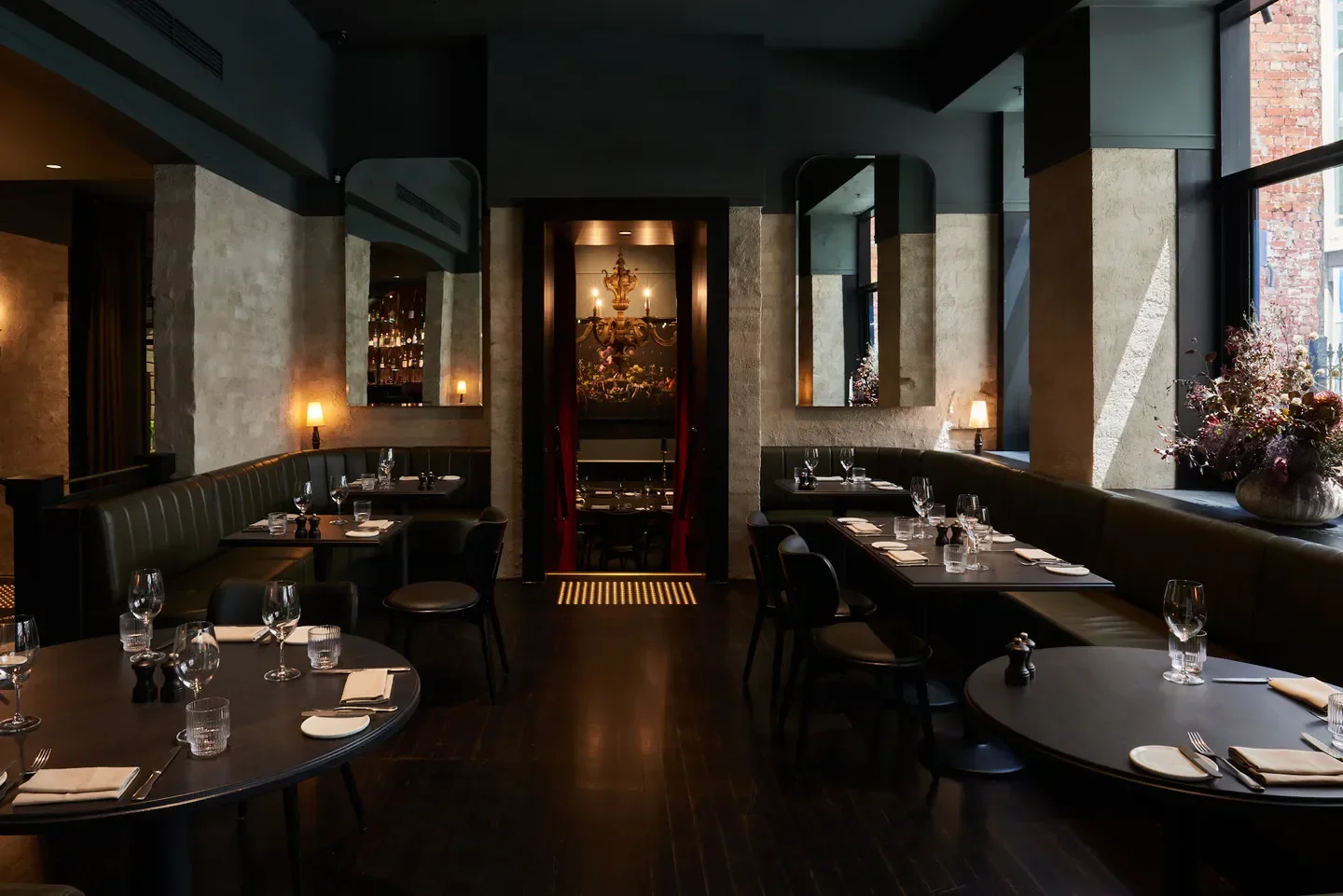 Interior of Chancery Lane restaurant in Melbourne, featuring elegant dining tables and lighting.