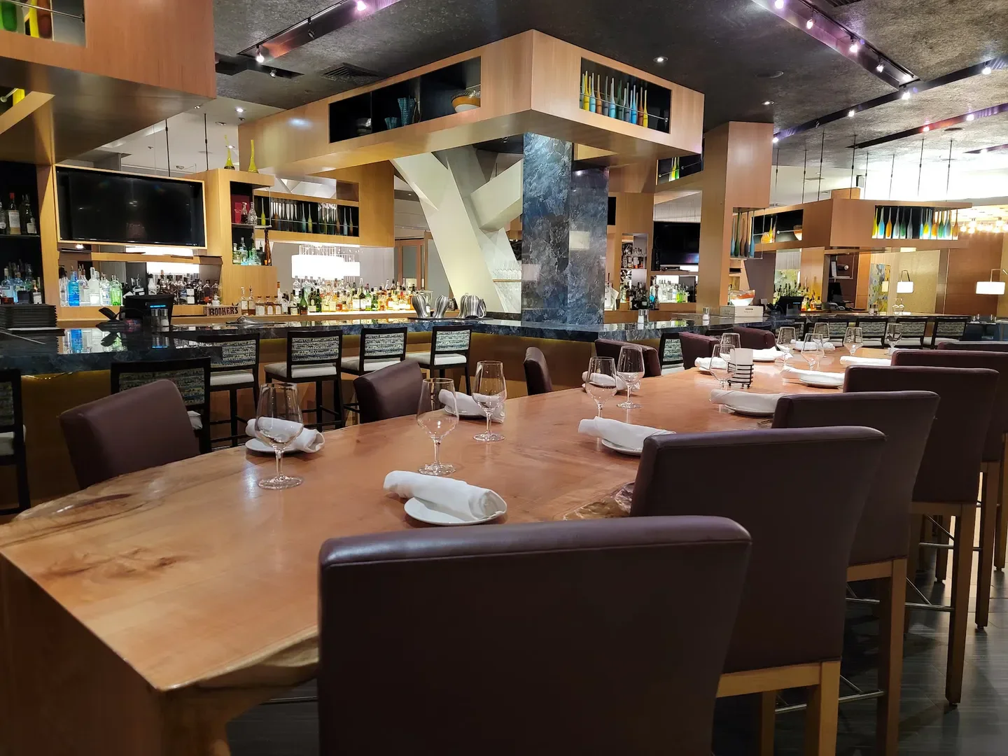 Elegant dining at Charlie Palmer Steak - Reno with a view of the bar in Reno, Nevada.