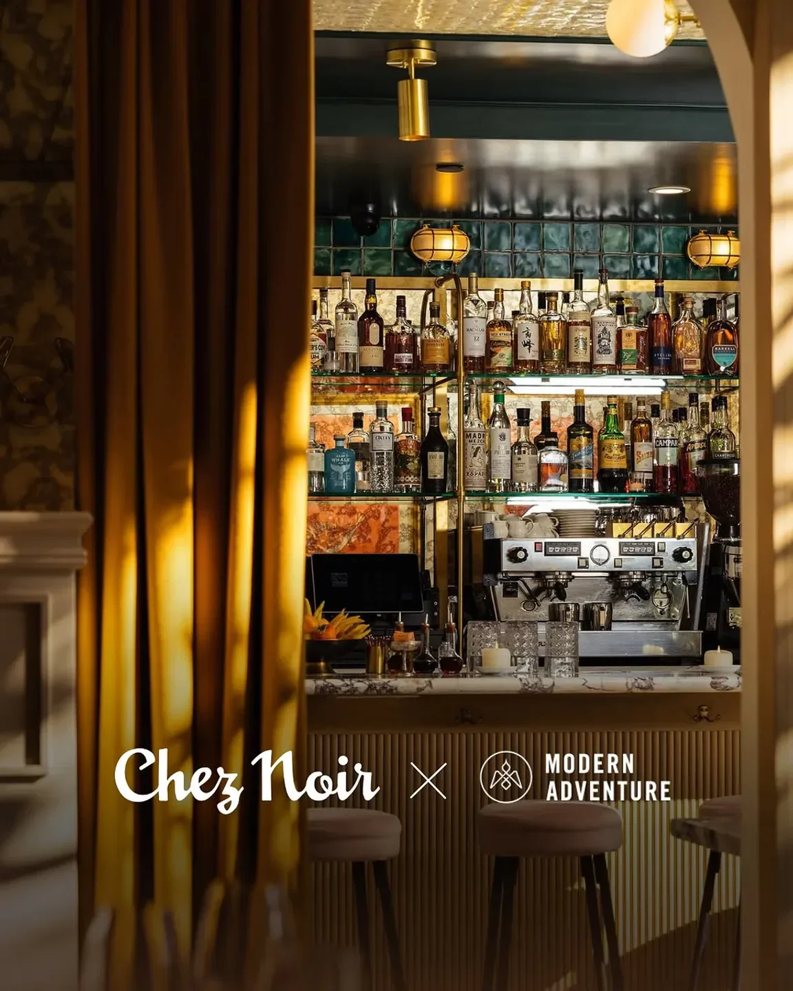 Interior bar at Chez Noir in Carmel, California, featuring cocktails and elegant design.