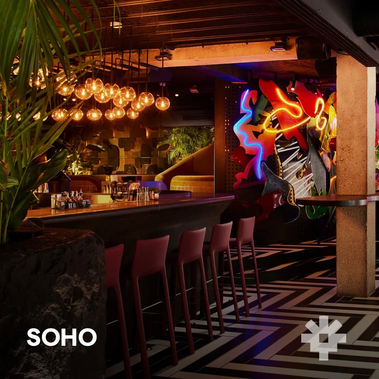 Chotto Matte London bar area with neon art and stylish seating
