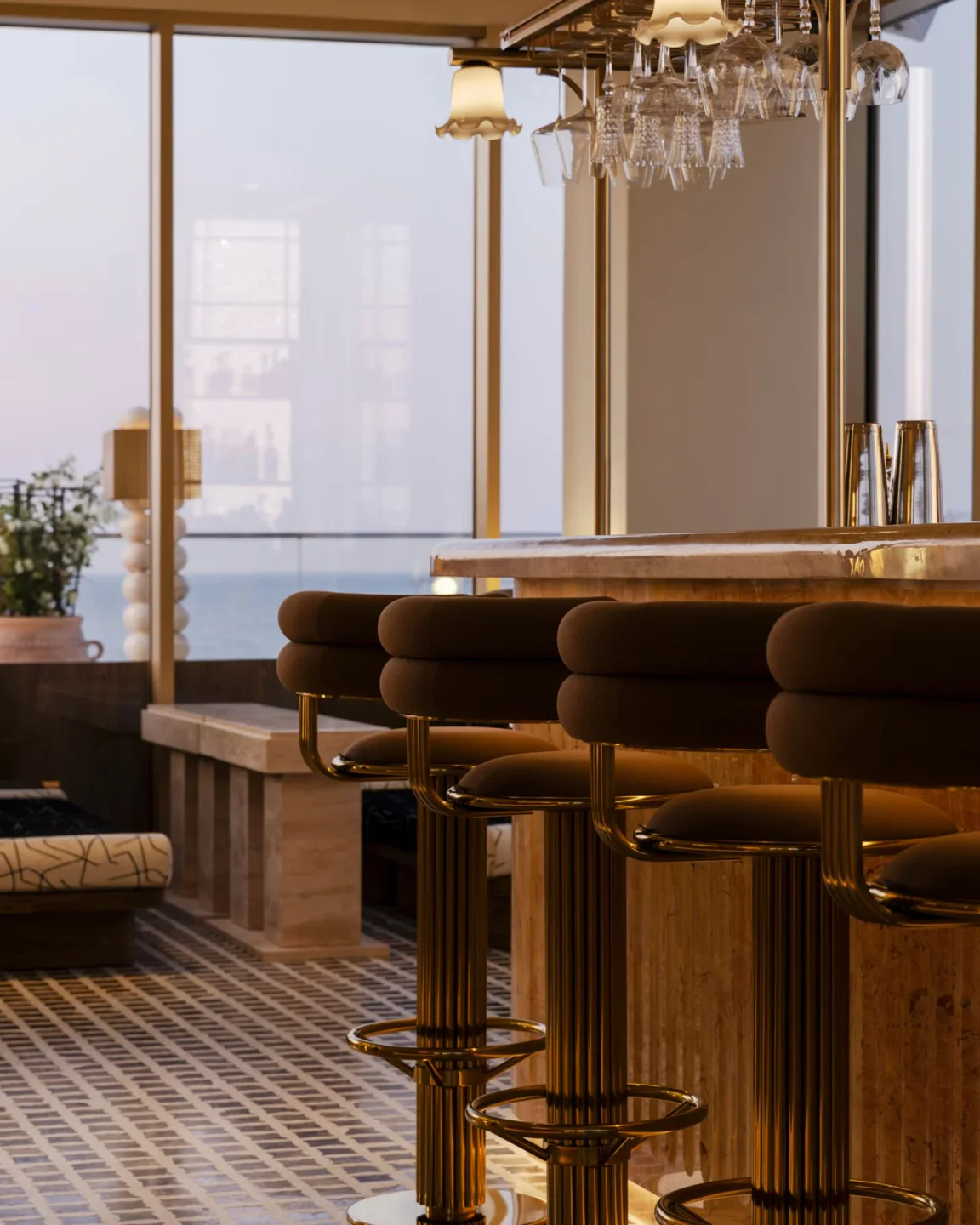 Chouchou beach club interior with elegant bar, seating, and ocean view in the city