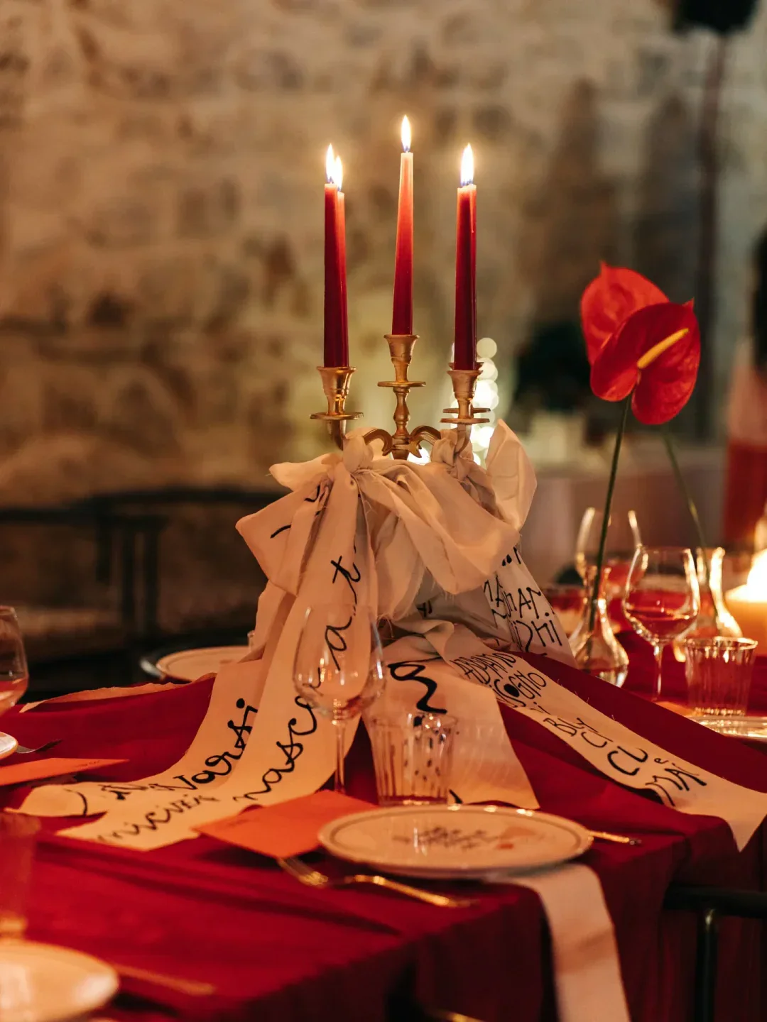 Romantic candlelit table setting at Cibus restaurant in Puglia, featuring elegant decor.