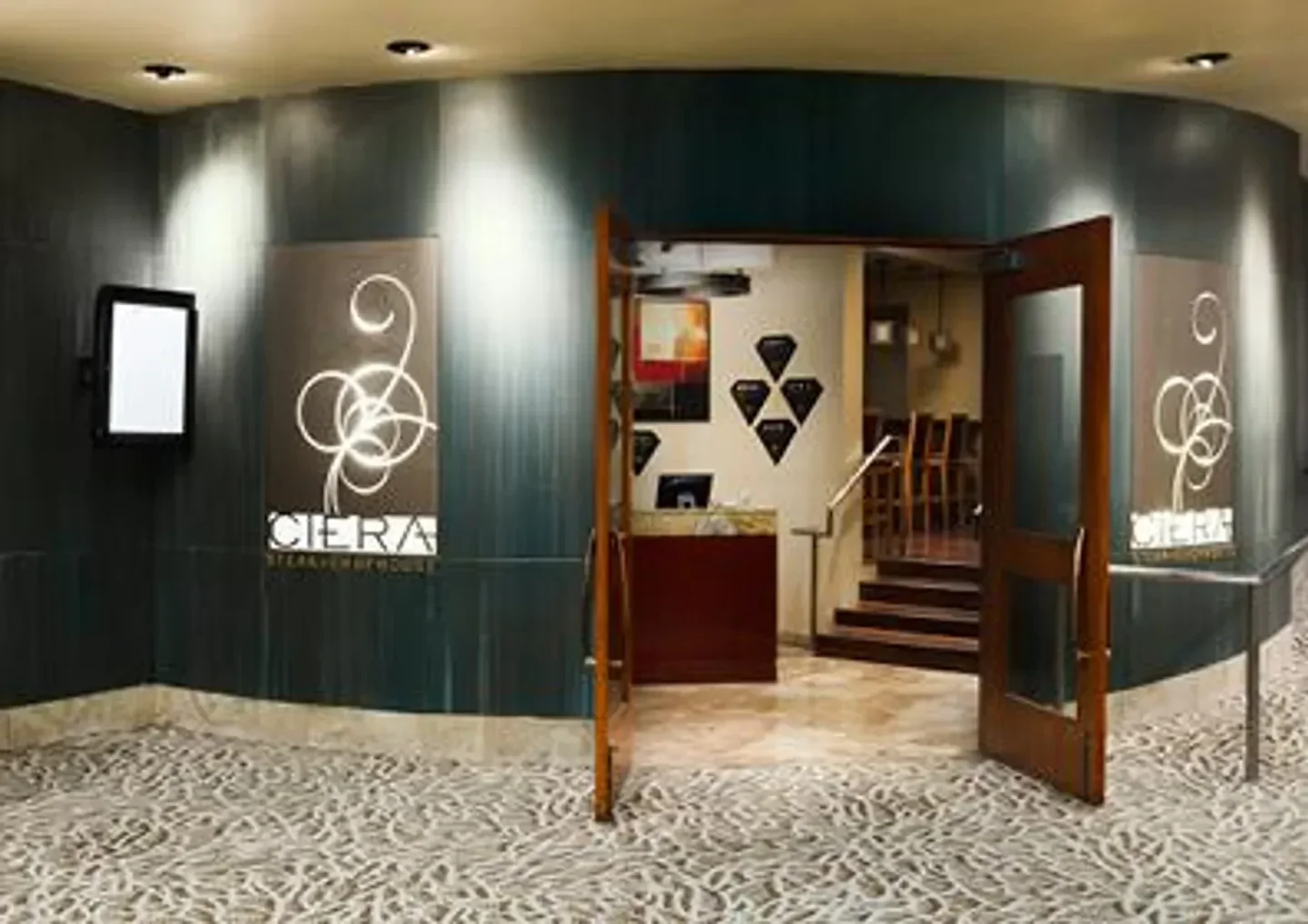 Entrance to Ciera Steak and Chophouse in Tahoe, showing decor and open door view