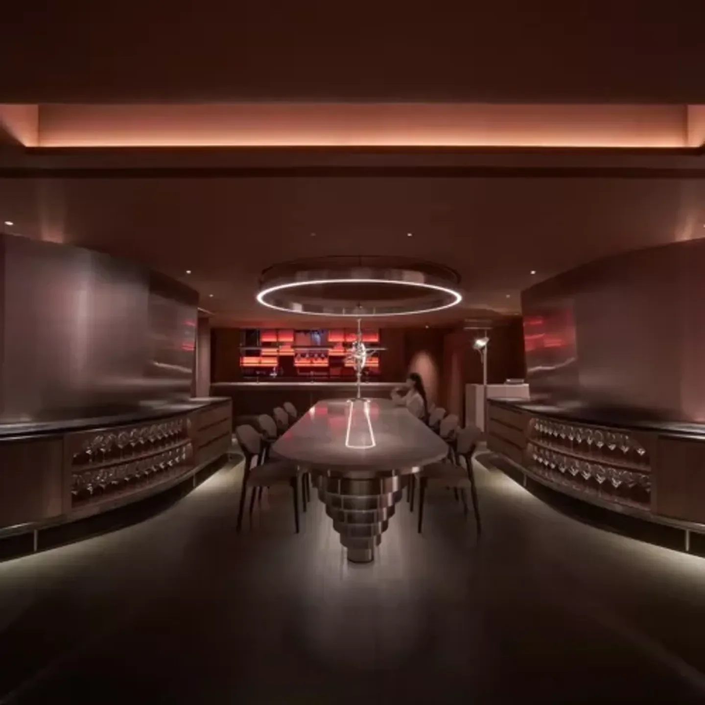 Elegant dining interior at Circum- restaurant in Taipei, featuring a long table and modern design.