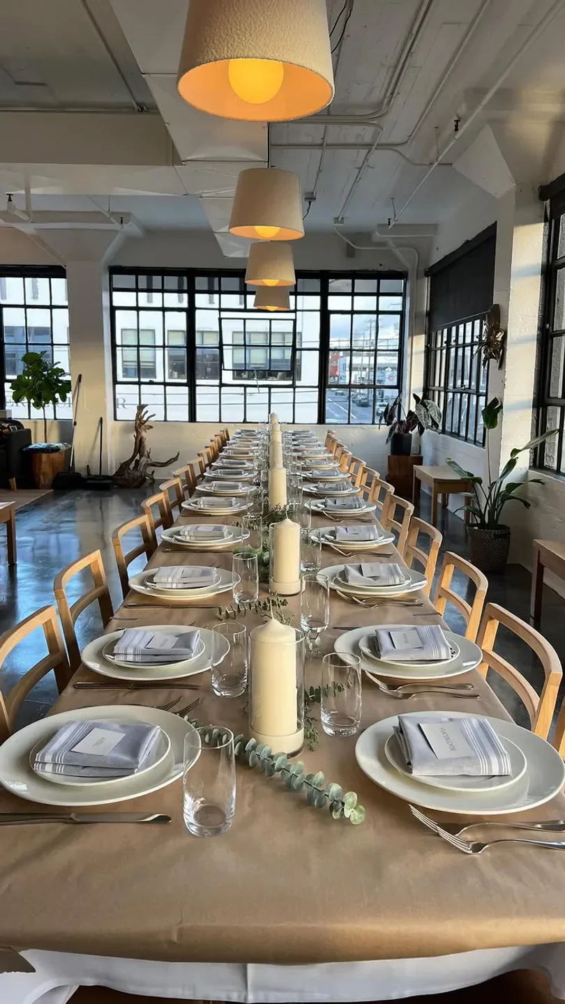 Elegant dining table set at Clarklewis Restaurant in Portland with natural light and decor