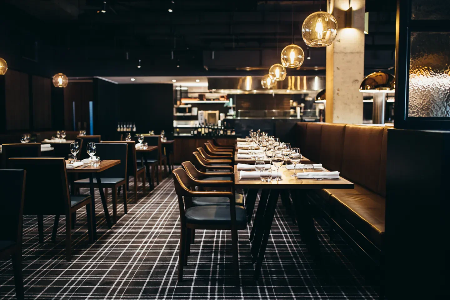 Interior dining at Coal Cellar Grill in Adelaide, with tables set for a meal