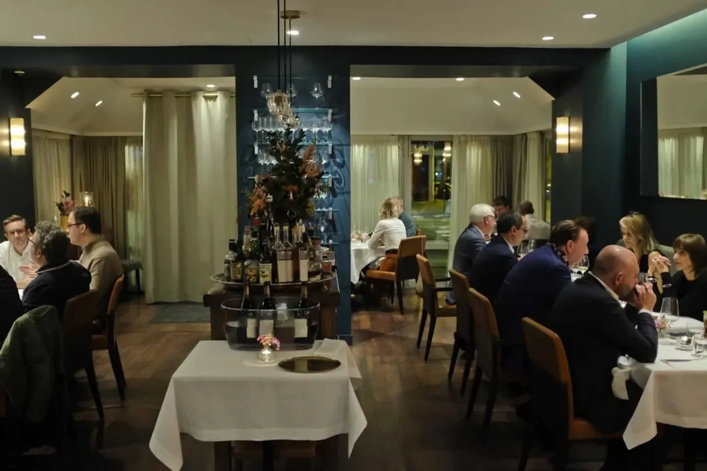 Interior dining at Comice restaurant in Paris, showcasing elegant ambiance and tables
