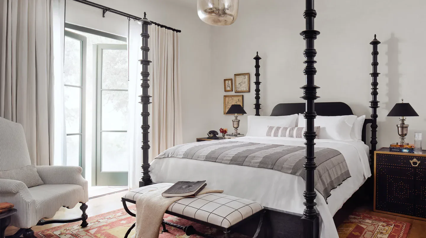 Elegant bedroom at Commodore Perry Estate, Auberge Resorts Collection in Austin, Texas.