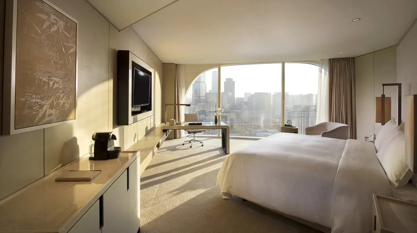 Luxury hotel room at Conrad Beijing with stunning Beijing skyline views.