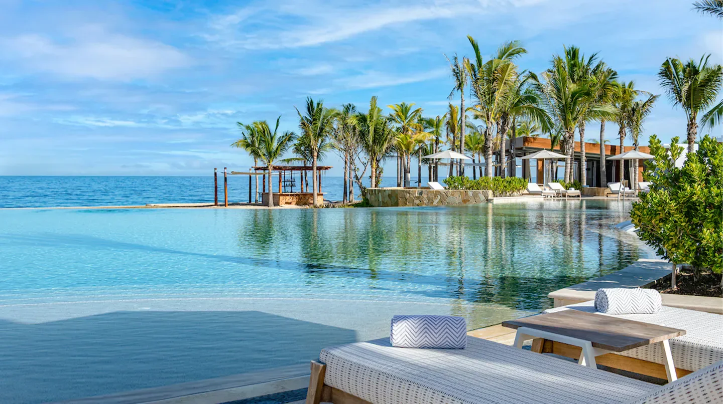 Stunning infinity pool at Conrad Punta de Mita, Puerto Vallarta, overlooking the ocean.