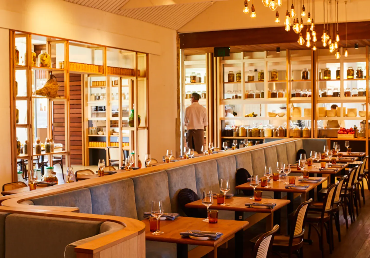 Interior of Coogee Common restaurant in Perth, featuring elegant dining tables and decor.