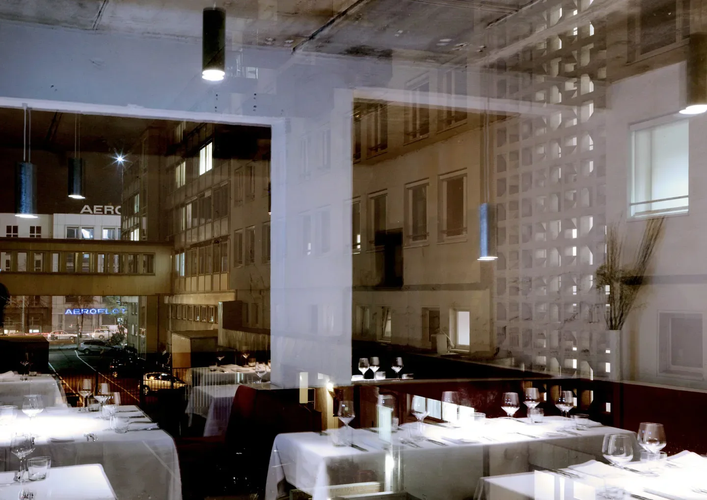 Interior view of Cookies Cream restaurant in Berlin, with stylish decor and city views.