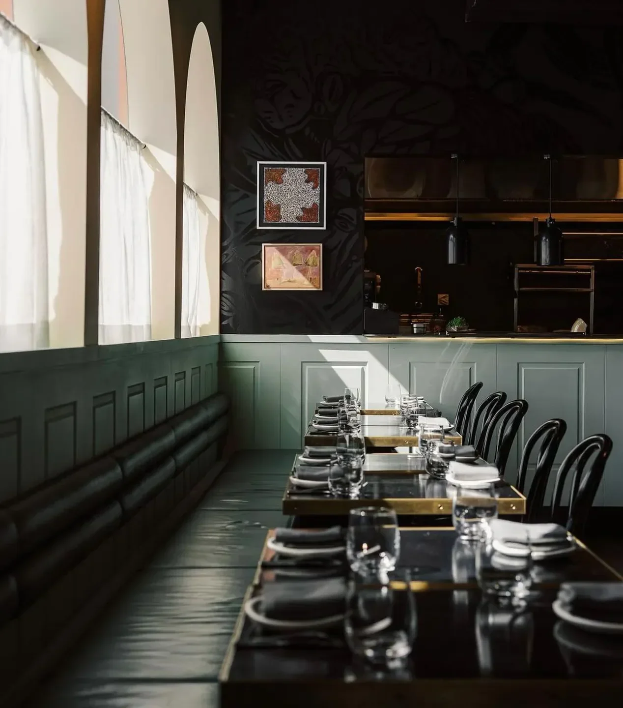 Interior dining at Corella Restaurant & Bar in Canberra, showcasing elegant table settings.