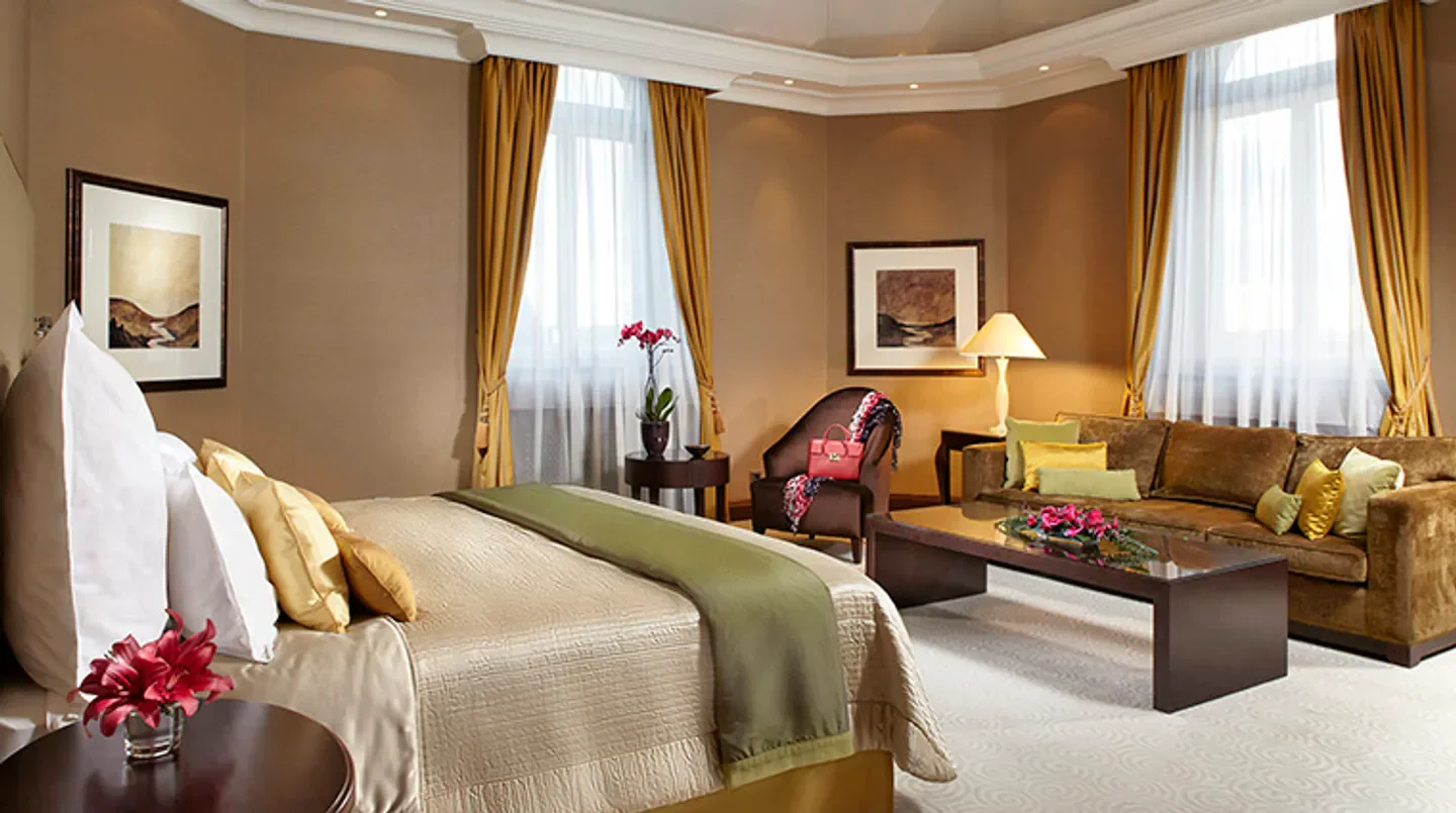 Luxury bedroom at Corinthia Budapest hotel, featuring elegant decor in Budapest, Hungary.