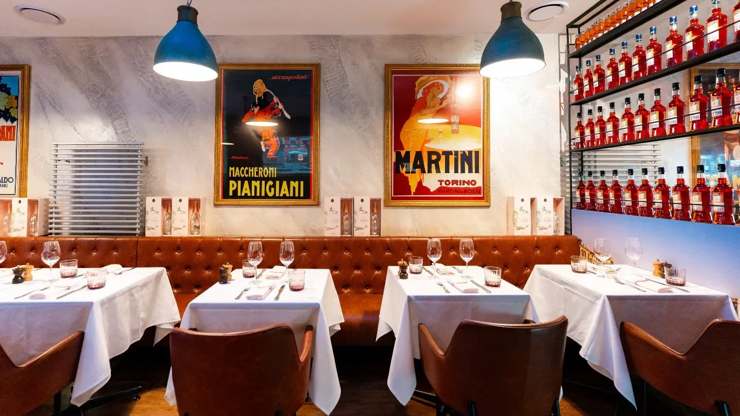 Interior of Cosi Bar Ristorante in Melbourne with classic decor and dining tables