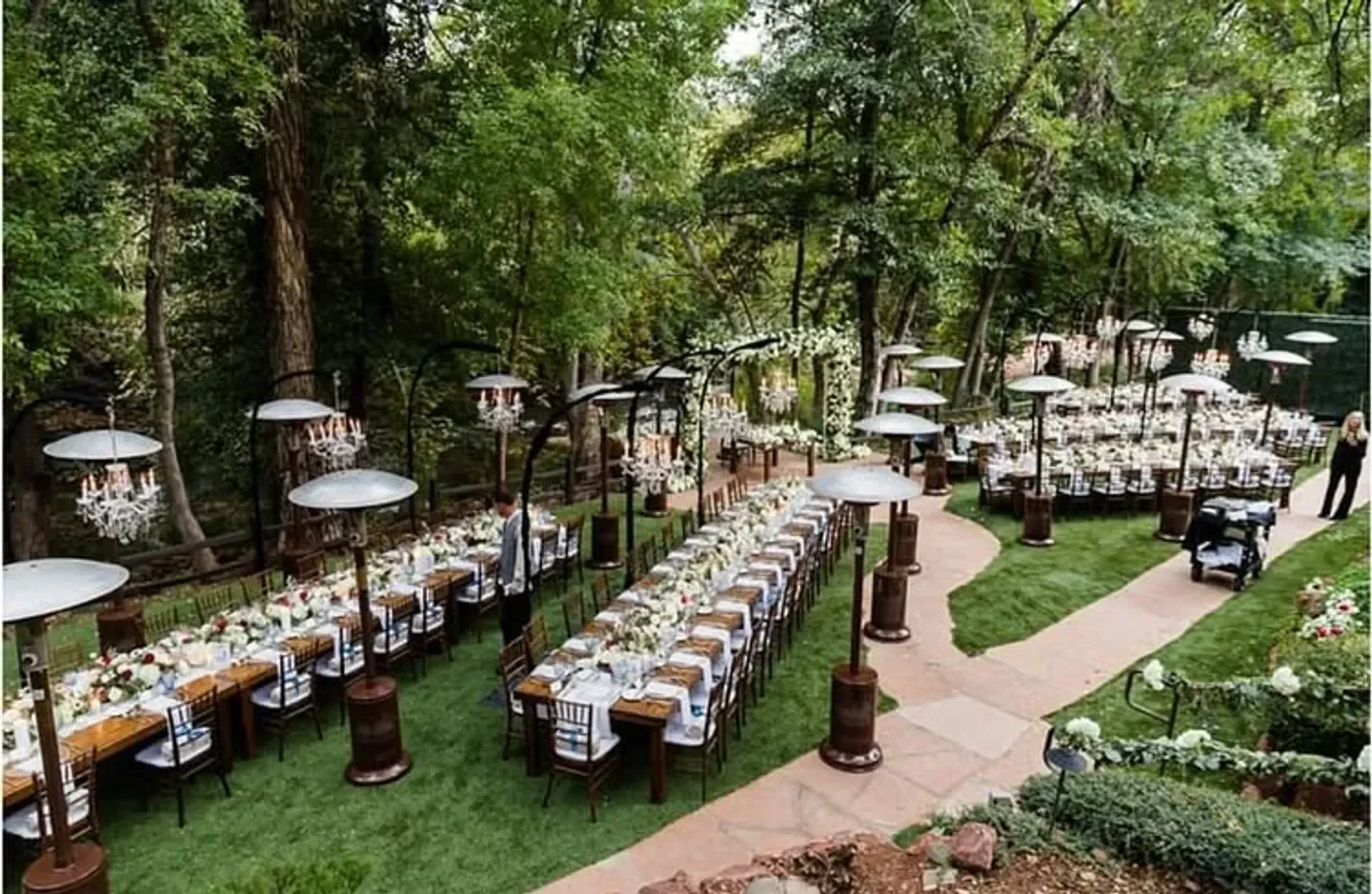 Outdoor dining at Cress on Oak Creek in Sedona, tables set among lush greenery.
