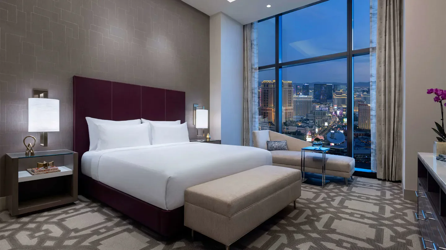Luxury hotel room at Crockfords Las Vegas, LXR Hotels & Resorts, with city views of Las Vegas.