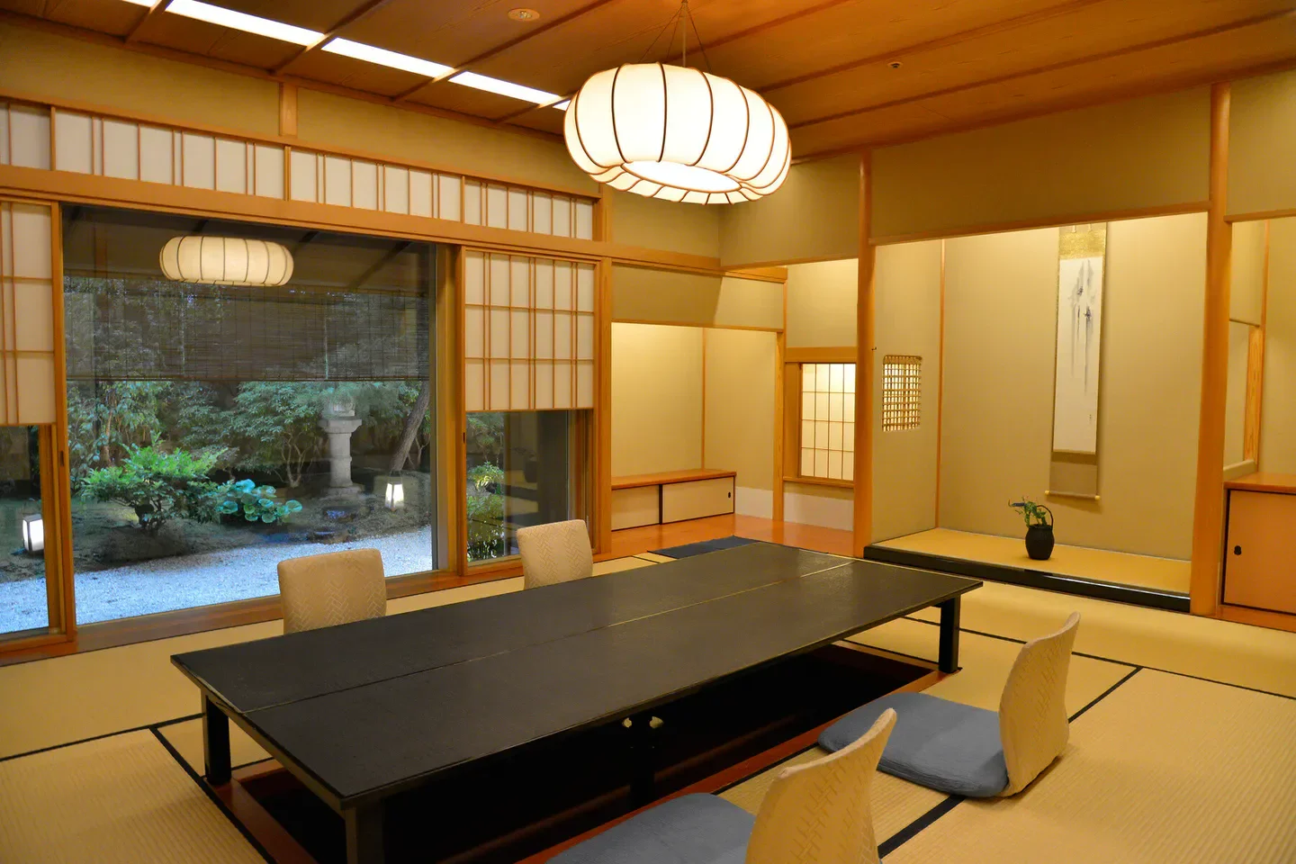 Interior of Daigo restaurant in Tokyo, showcasing traditional Japanese design and garden view.