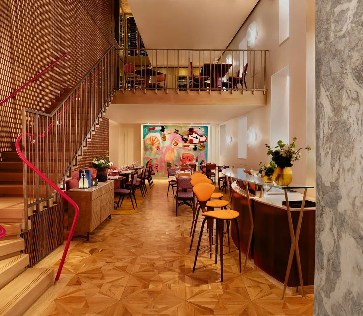 DaV Mare Italian Riviera restaurant interior with vibrant art, modern seating, and multi-level dining.