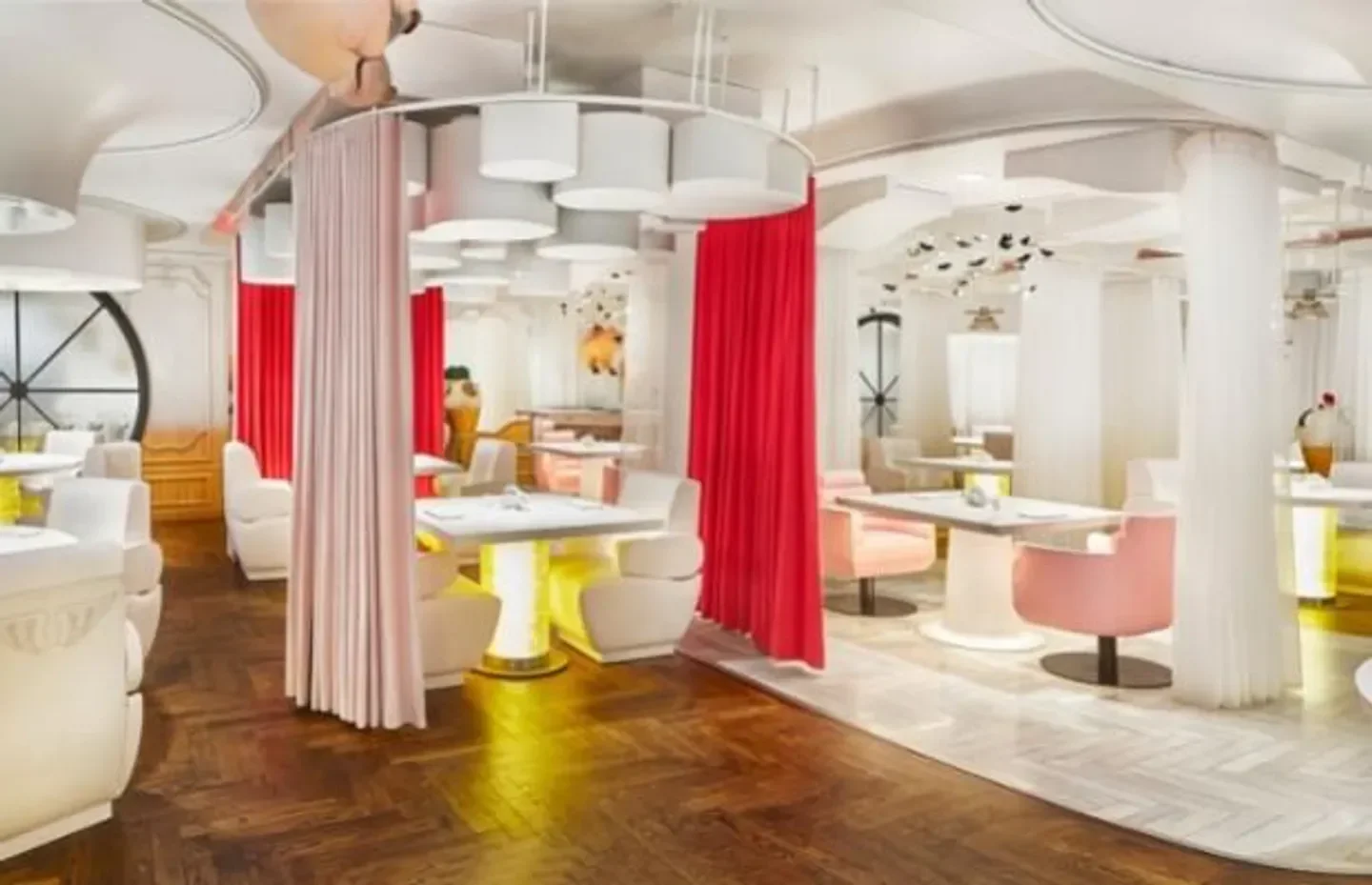 Interior of DiverXO restaurant in Madrid, with creative decor and pink and red accents.