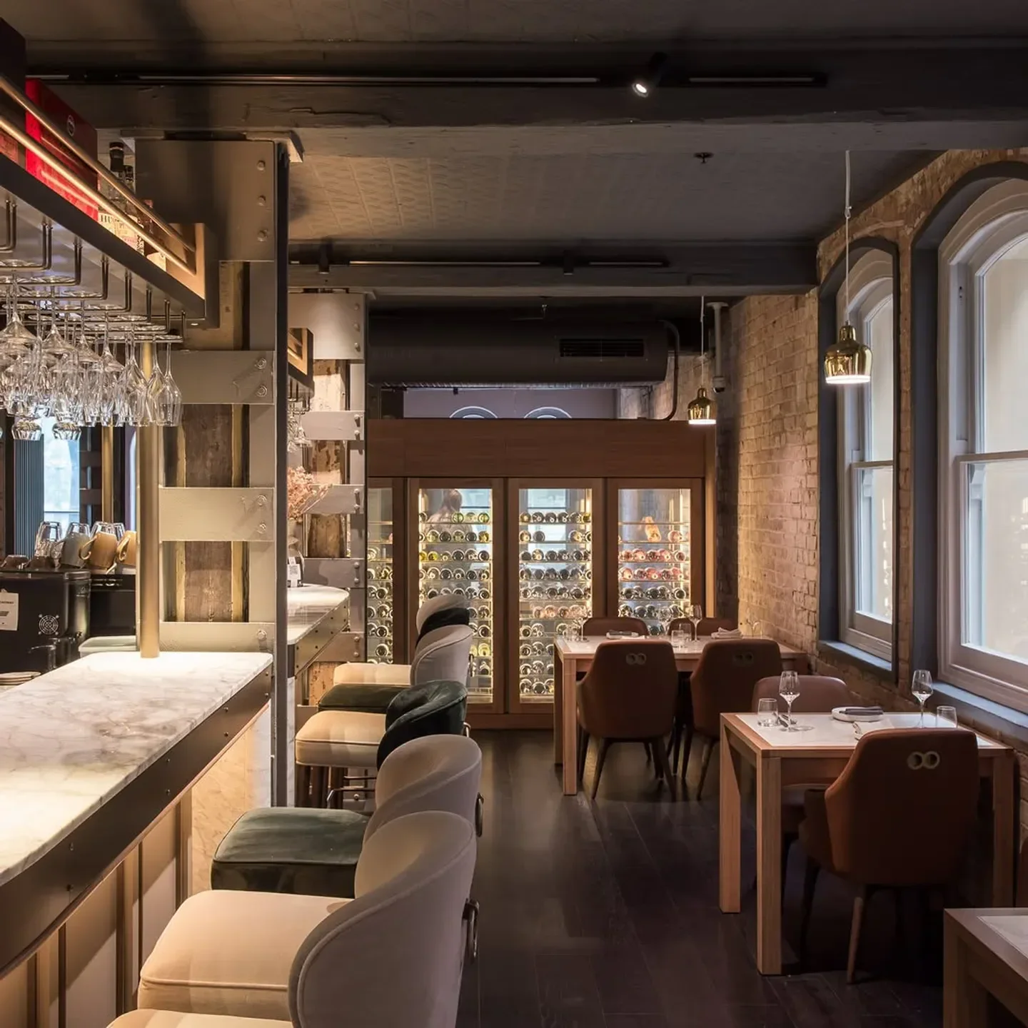 Interior of Dixson & Sons restaurant in Sydney, showcasing a stylish bar and dining area.