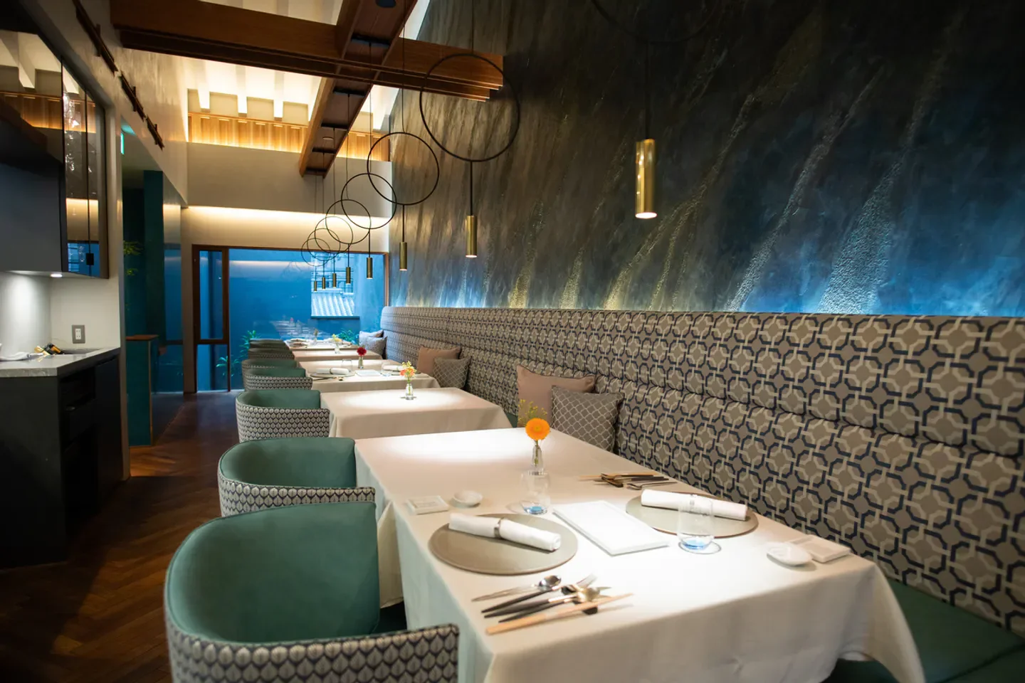 Elegant interior of DODICI restaurant in Kyoto, with stylish seating and decor.