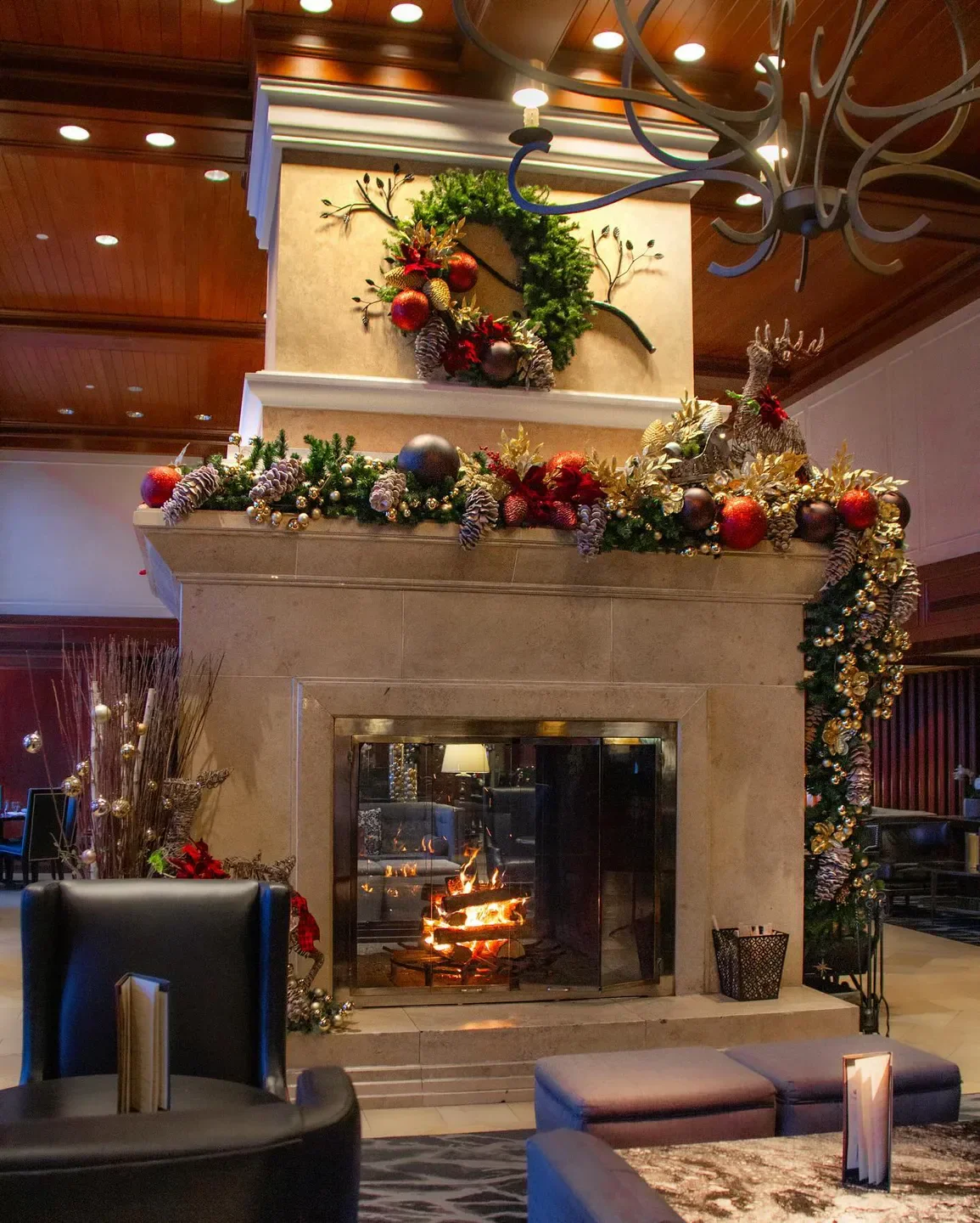 Cozy fireplace at Eden restaurant in Banff, decorated for the holidays