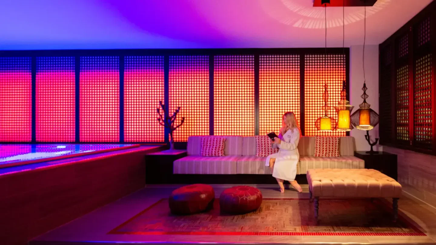 Cozy seating area at Edvard in Vienna with stylish lighting and decor