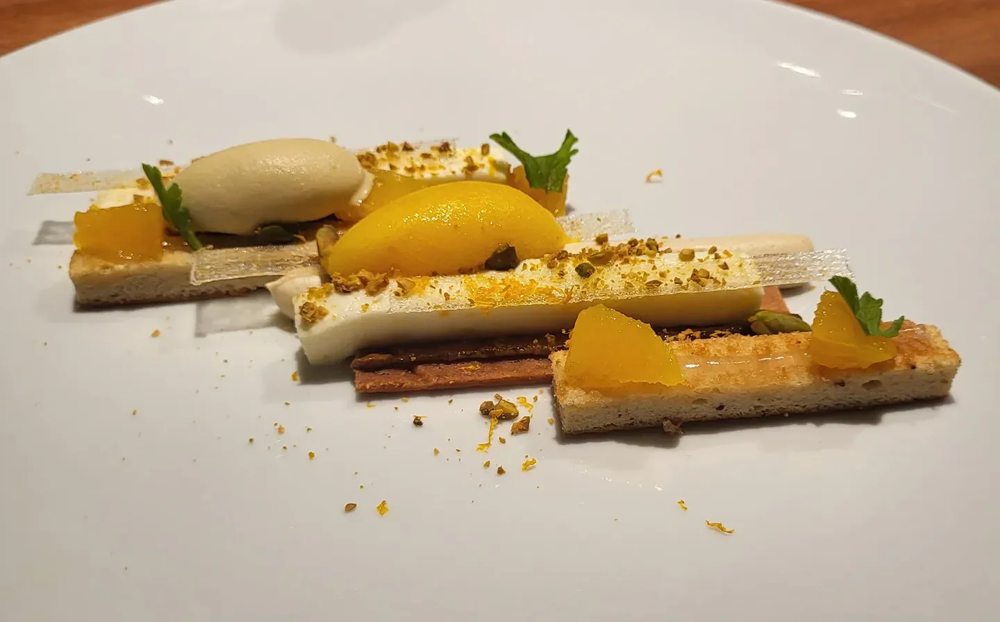 Deconstructed dessert at Ekaitza restaurant in the French Pays Basque, featuring sorbet and fruit.