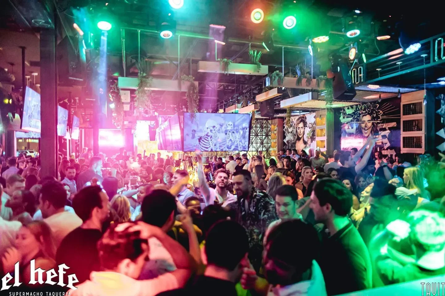 Energetic crowd at El Hefe nightclub in Scottsdale, with vibrant lighting and lively atmosphere.