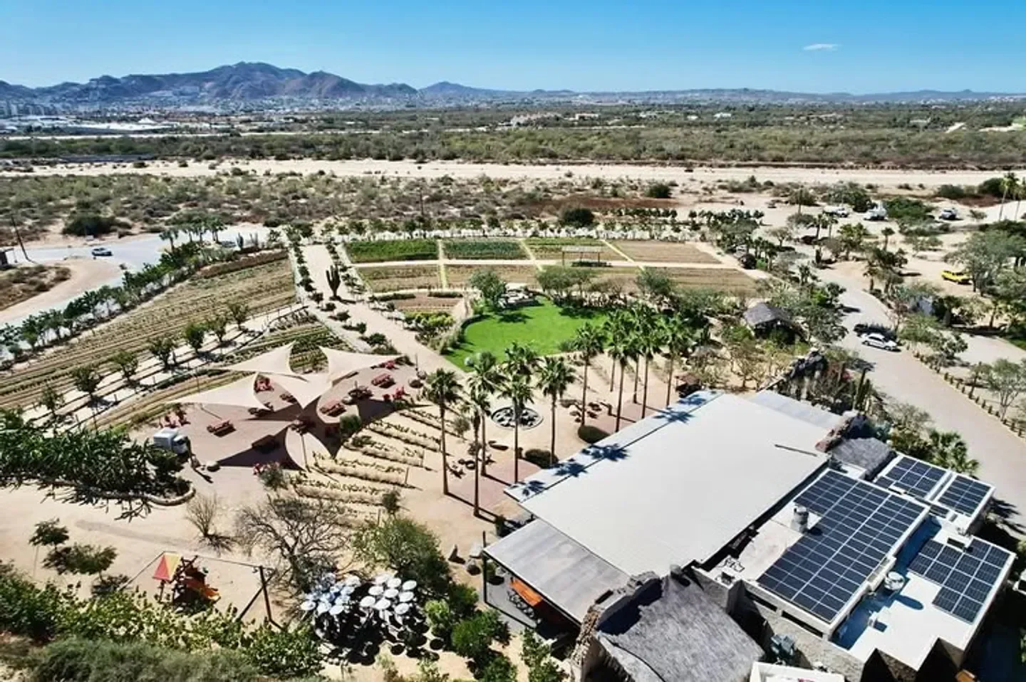 Aerial view of El Huerto Farm to Table restaurant in Los Cabos, with farm and dining areas