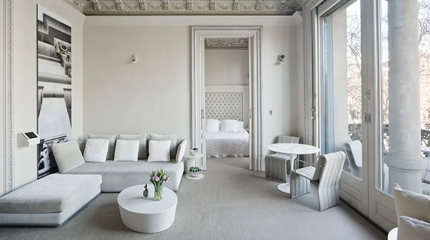 Elegant suite at El Palauet Living Barcelona, offering luxurious comfort in Barcelona.