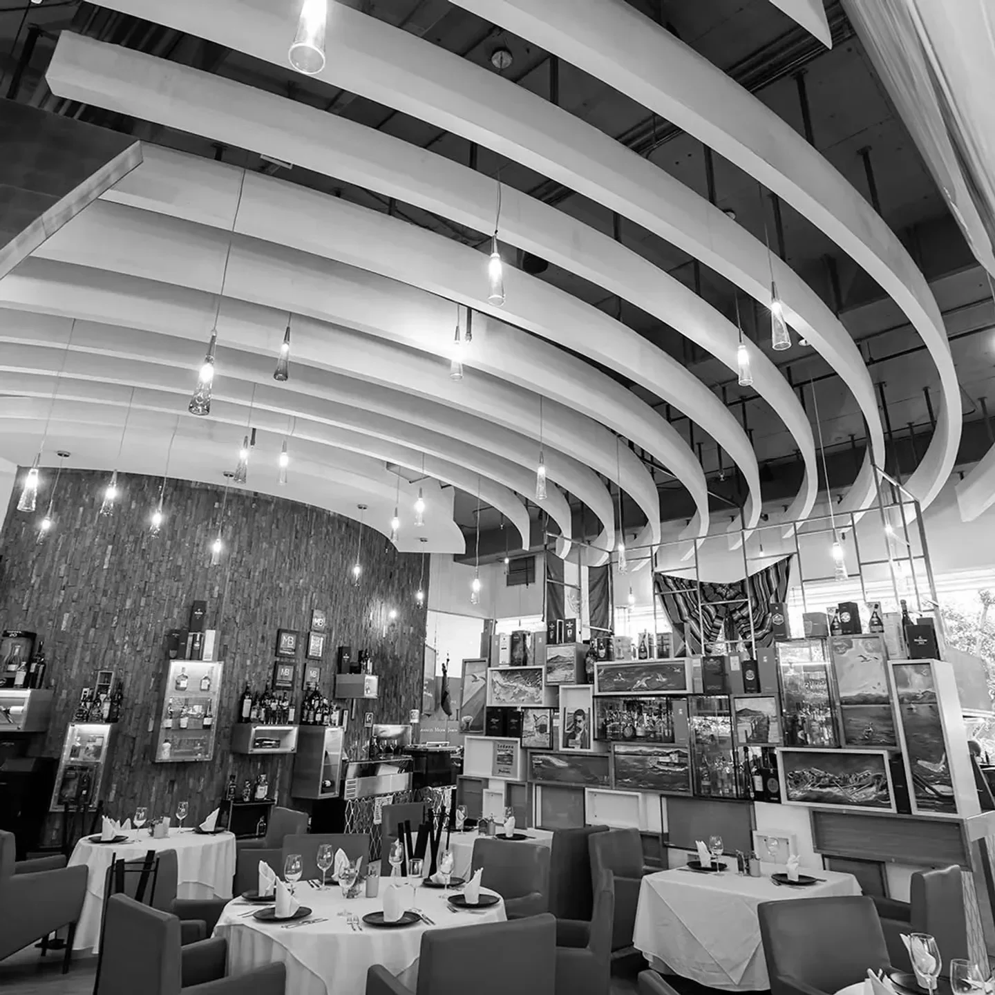 Interior of El Puntal del Norte restaurant in Mexico City, featuring unique ceiling design.