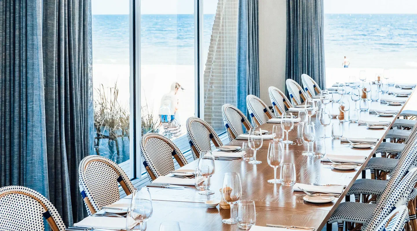 Dining setup at Elwood Bathers in Melbourne, overlooking the beach.