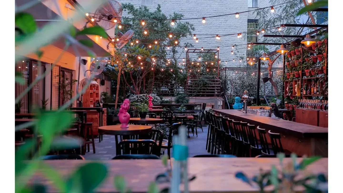 Emesh nightclub in Tel Aviv: outdoor patio with lights and bar seating.