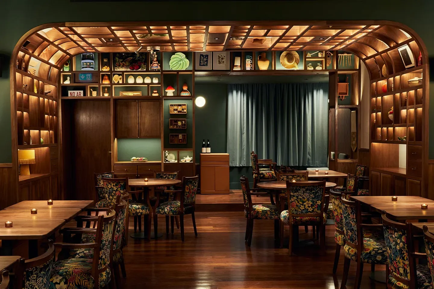 Encanto restaurant in Lisbon, showcasing a stylish interior with wooden design and decor