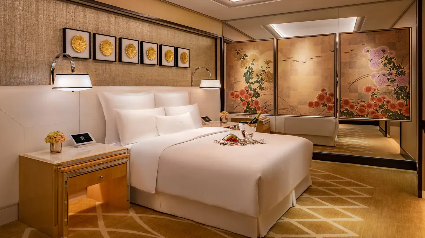 Luxury hotel room at Encore Macau with elegant decor and artwork in Macau.