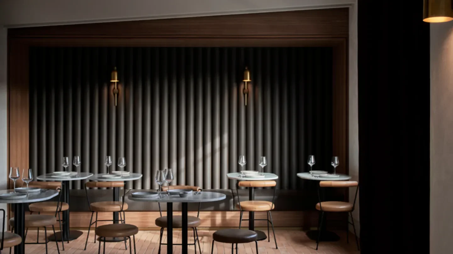 Stylish interior dining at Enoteca Boccaccio, Melbourne restaurant with modern decor and tables.