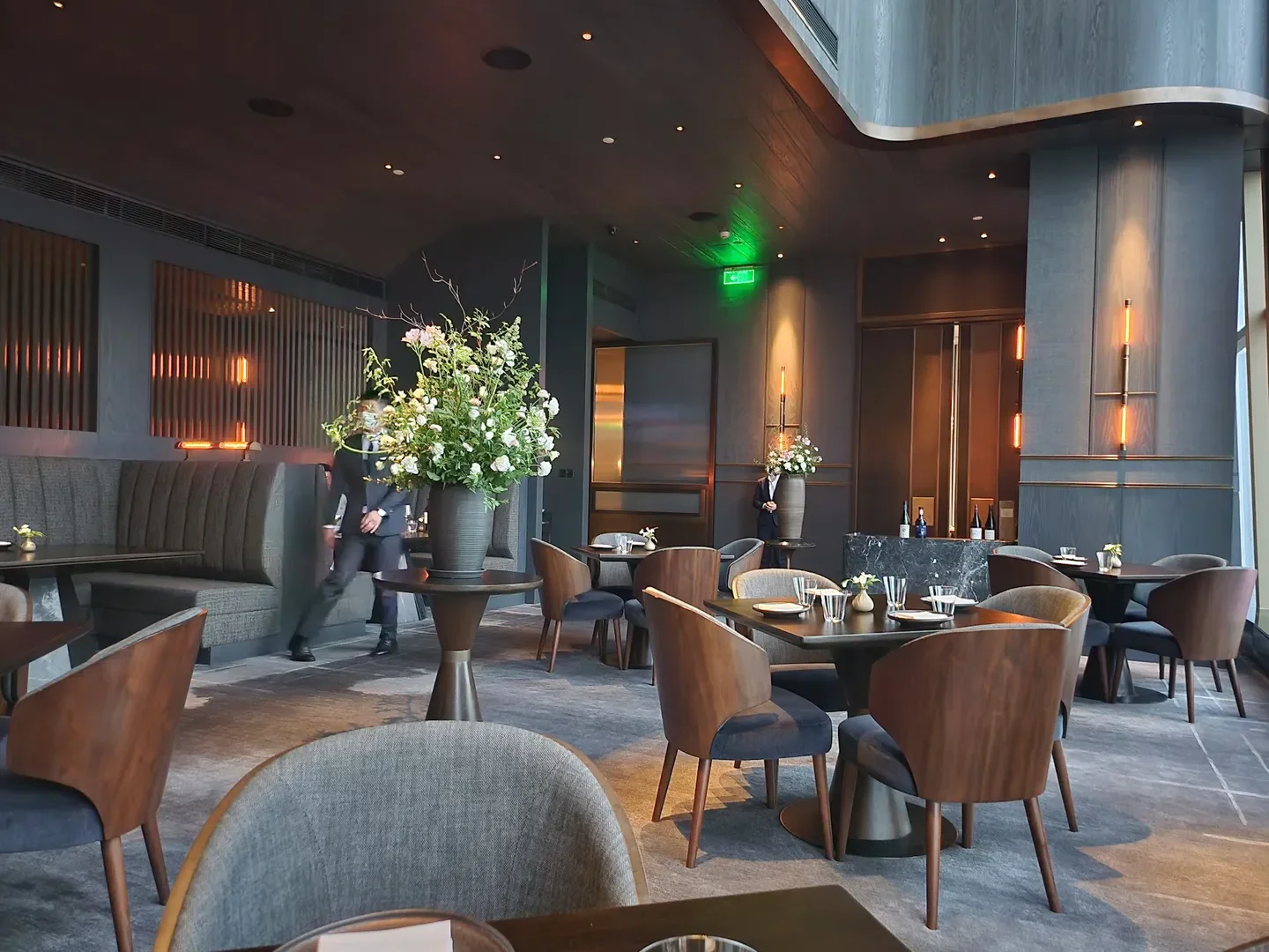 Elegant interior of Ensue restaurant in Shenzhen, featuring stylish decor and dining tables.