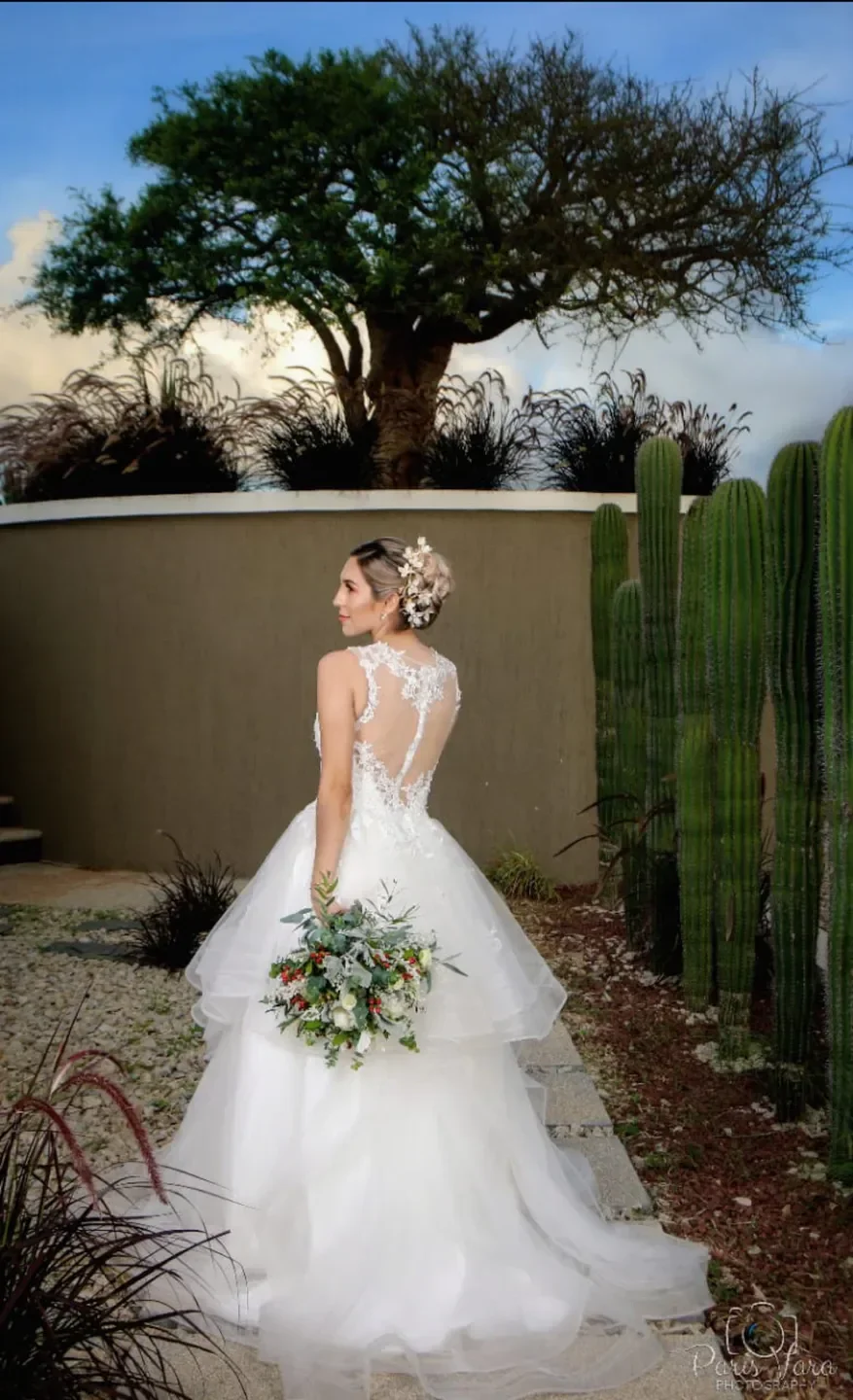 Bride at Esencia Wellness Spa in Cabo San Lucas, posing in her wedding dress