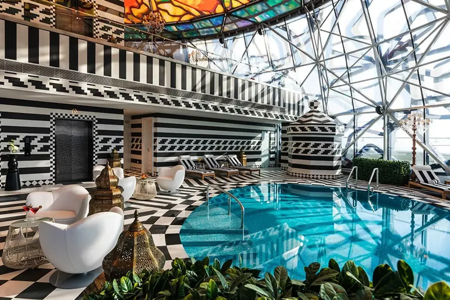 ESPA at Mondrian Doha spa featuring a pool in Doha with stylish black and white decor.