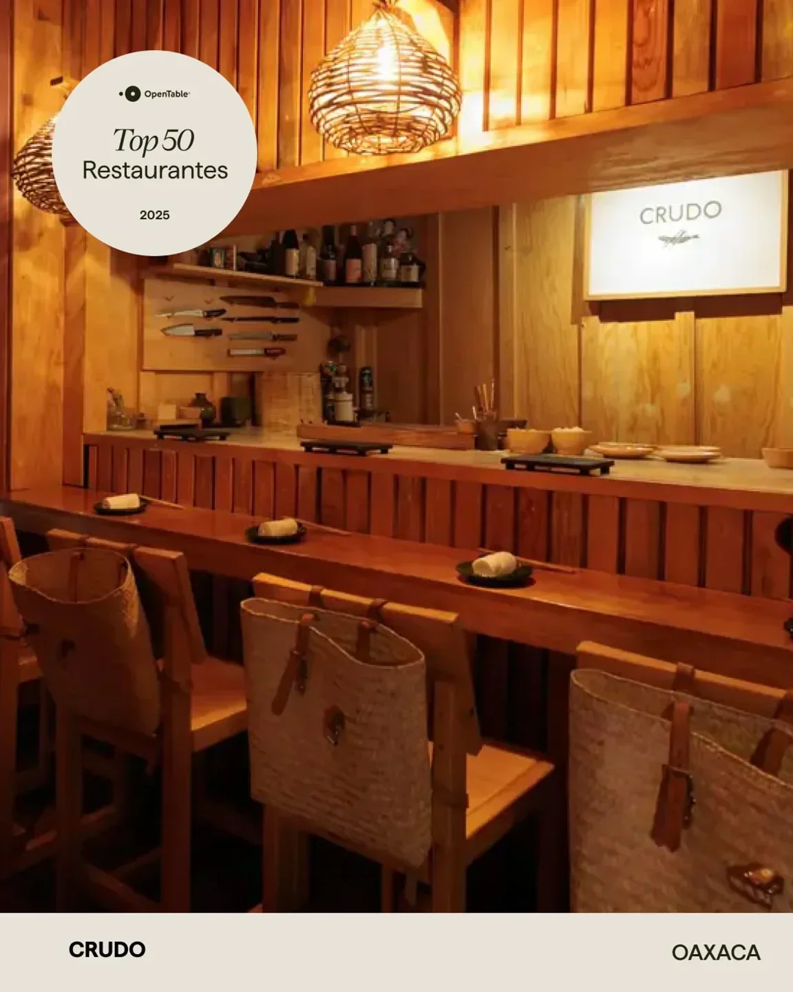 Cozy interior of Esquina Común restaurant in Mexico City, featuring wooden decor and lighting.