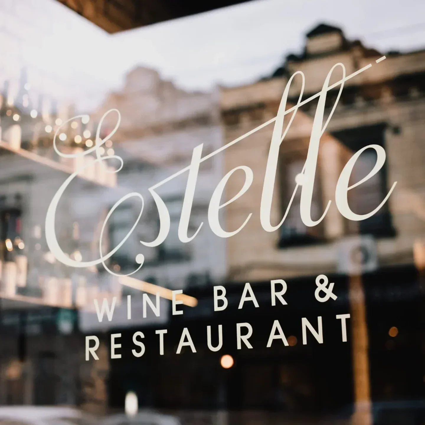 Estelle restaurant in Melbourne, seen through the window, Wine Bar & Restaurant sign.