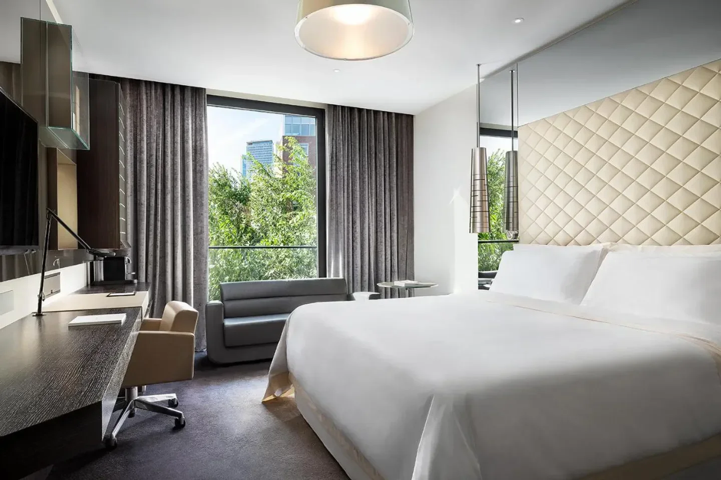 Luxury bedroom at Excelsior Hotel Gallia, A Luxury Collection Hotel in Milan, featuring city view