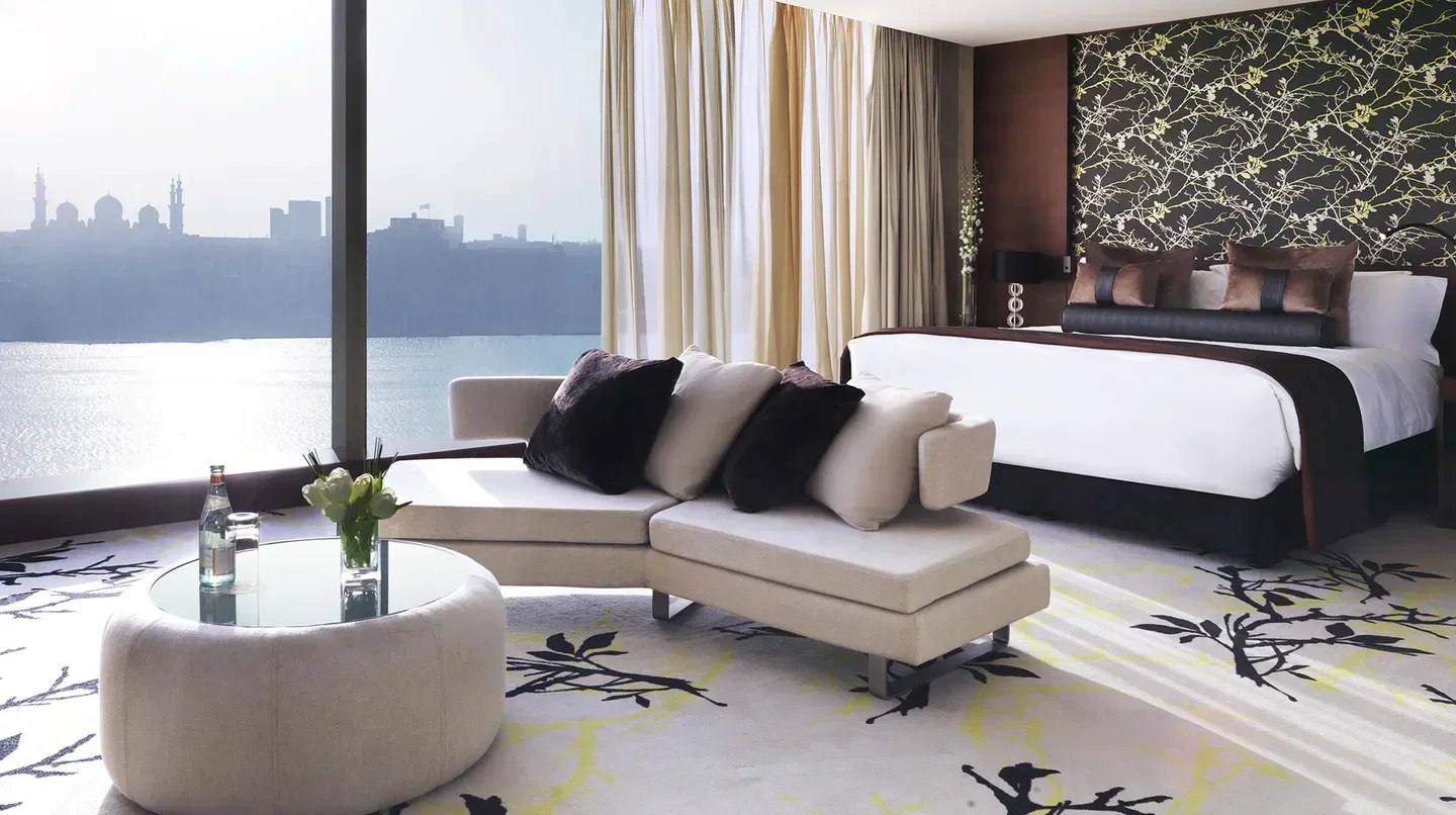 Luxury suite at Fairmont Bab Al Bahr in Abu Dhabi, offering stunning city views.
