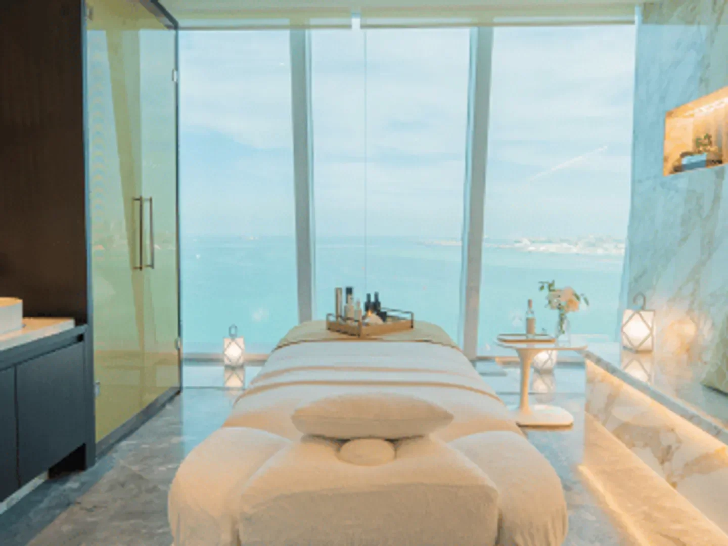 Spa treatment room at Fairmont Doha Spa & Pillar with panoramic sea views
