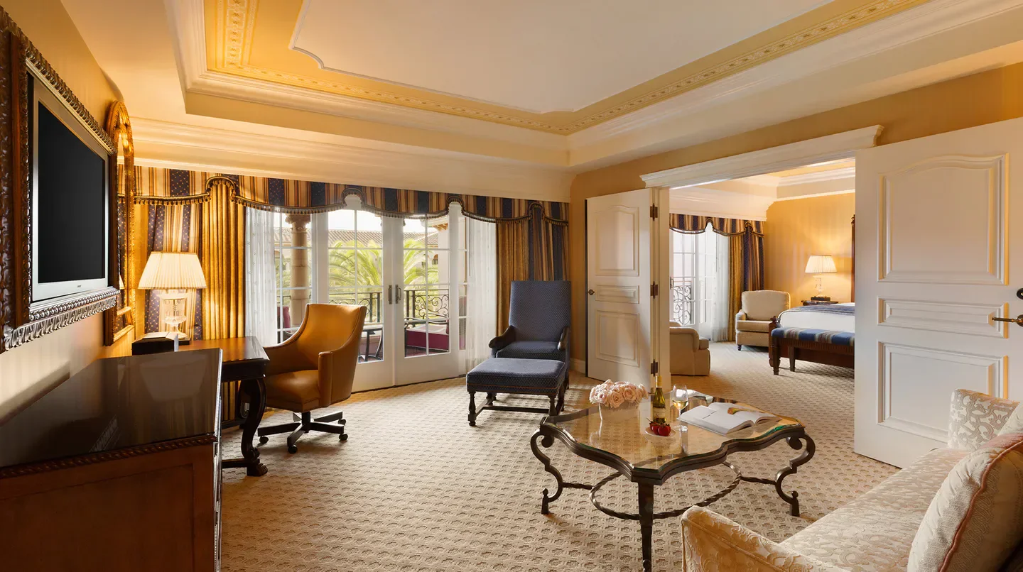 Luxury hotel suite interior at Fairmont Grand Del Mar, San Diego, with balcony view.