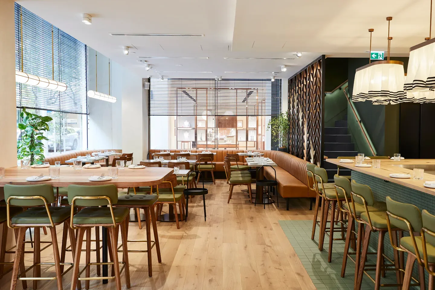 Interior of Farmer's Daughters restaurant in Melbourne, featuring stylish seating and design.